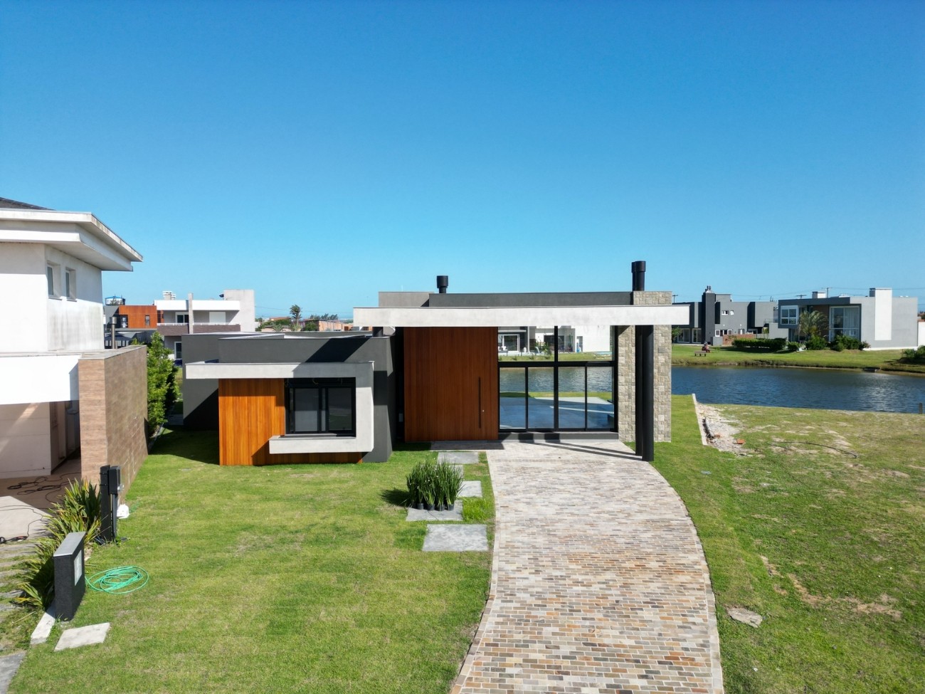 Casa em Condomínio 4 dormitórios para venda, Condomínio Riviera I em Xangri-lá | Ref.: 11039